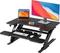 HUANUO 32' Z Shaped Stable Standing Desk Converter, Height Adjustable Sit Stand Up Desk Riser, Dual Monitor and Laptop Workstation with Wide Keyboard Tray, Desk Lifter for Home Office