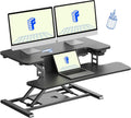 FLEXISPOT 32' Motorized Standing Desk Converter, Electric Stand up Desk Riser, Sit to Stand Dual Monitor and Laptop Workstation with Wide Keyboard Tray, Black