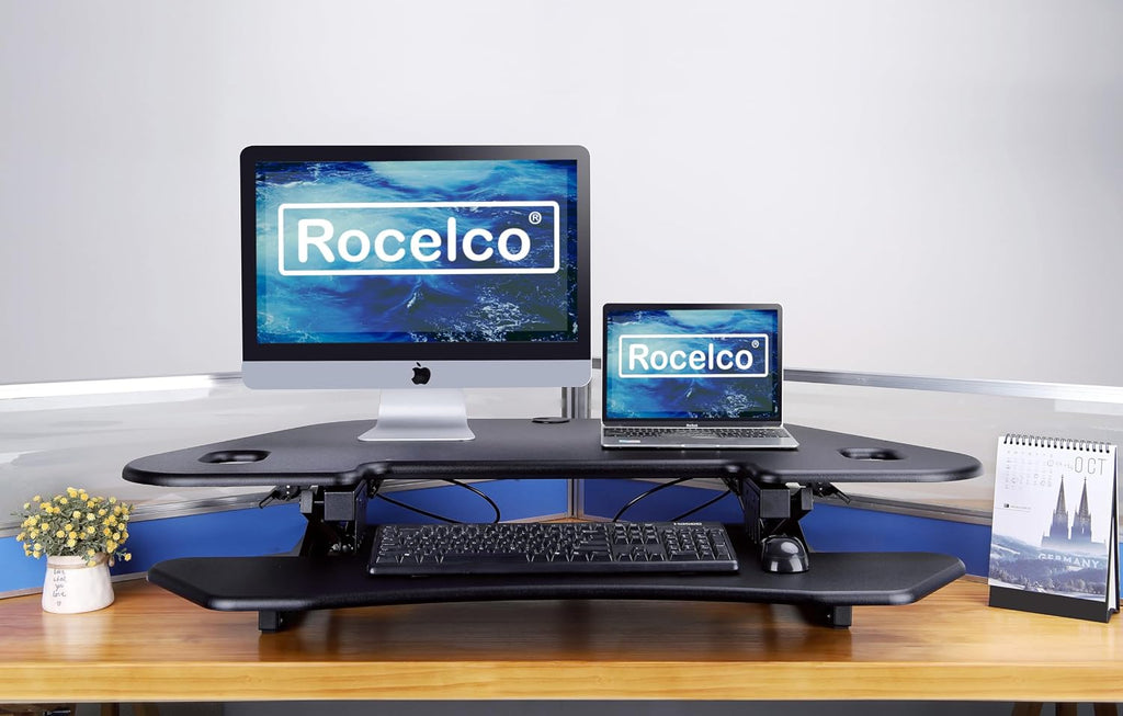 Rocelco 46' Height Adjustable Corner Standing Desk Converter with AC Outlet and USB Charger - Sit Stand Up Dual Monitor Tabletop Riser Workstation - Large Keyboard Tray - Black (R CADRB-46-ACUSB)