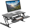 Mount-It! 38 Inch Standing Desk Converter - Gas Spring Sit Stand Desk Riser for Dual Monitors - Height Adjustable Desktop Workstation with Keyboard Tray - Black
