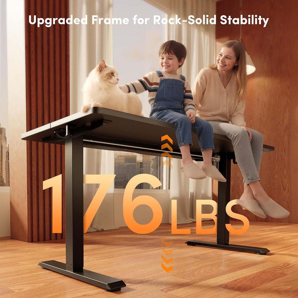 FEZIBO Standing Desk, 55×28 Inches Electric Height Adjustable, Sit Stand Up, Computer Office Desk with Splice Board, Black Frame/Black TOP