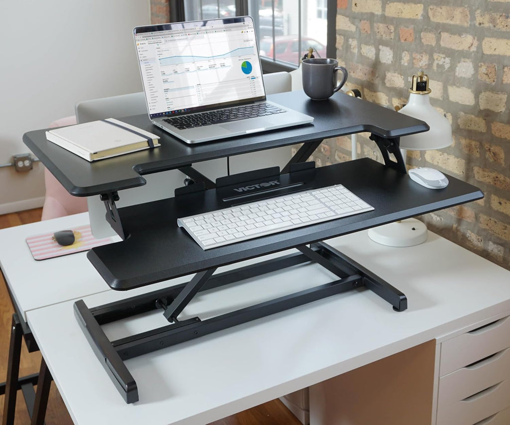 Victor DCX610 Height Adjustable Compact Standing Desk| Black| 33' Wide Sit-Stand Dual Monitor Desk and Laptop Riser Workstation| Compatible with Most Monitor Arms